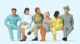 023-63201 - 1:32 - Sitzende Reisende